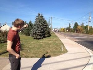 Ryan Taylor points to where the first shots were fired on Hildegard Drive following the Moncton shooting.