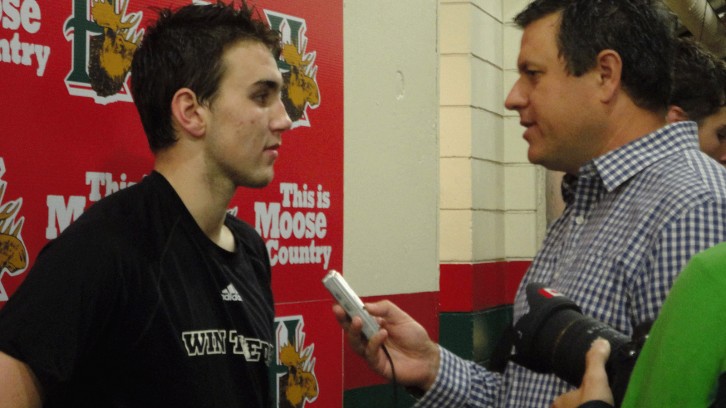 Halifax Mooseheads forward Kelly Bent talking with Willy Palov post-game.
