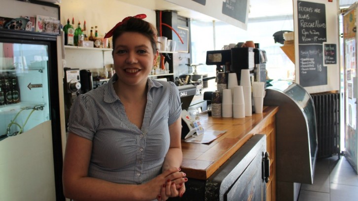 Walker at the cafe inside Halifax Backpackers, called Alteregos. Guests often relax in the cafe/ common area, she says. 