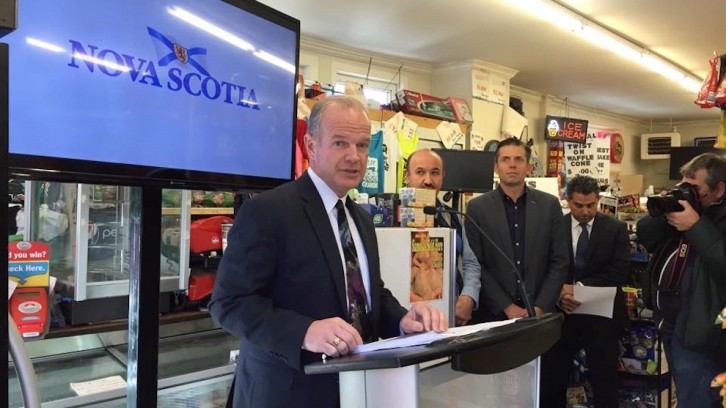 The minister of Service Nova Scotia Minister Mark Furey announcing a new service for convenience store businesses at Jubilee Junction Convenience. 