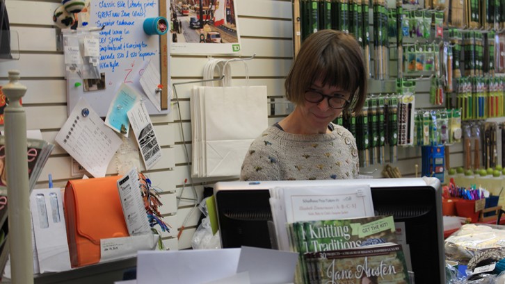 Mimi Fautley working at her store The Loop on Barrington Street, Halifax.