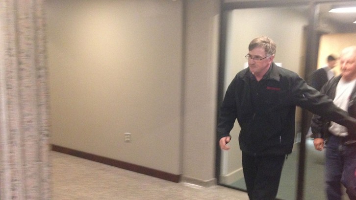 Paul Calnen leaves the courtroom after the jury is sequestered for the night.