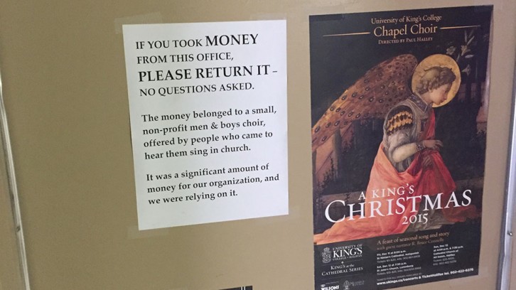 This sign was placed by Vanessa Halley, asking for the money to be returned.