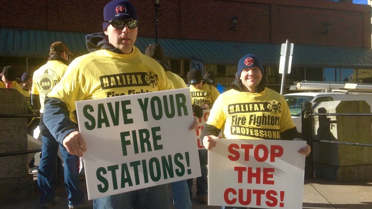 Dozens of shirts and signs were handed out by HRM career firefighters. 