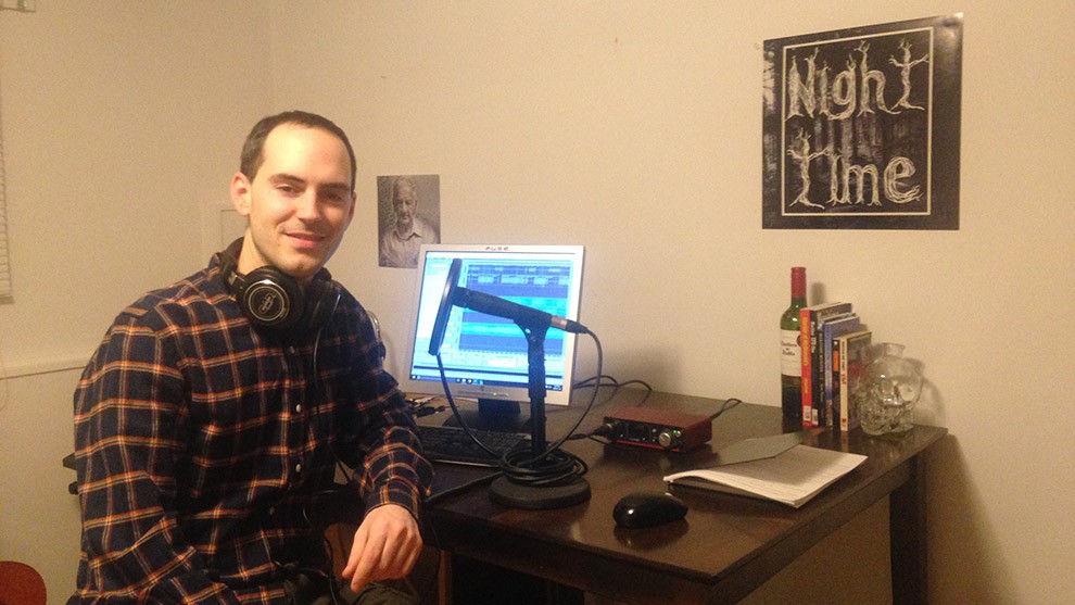Jordan Bonaparte sits at his desk, preparing to record the next episode of Night Time Podcast.