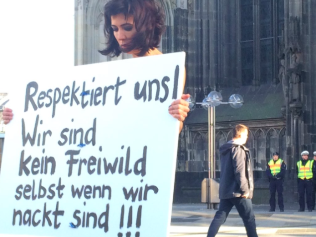 A German protester demands respect after the attacks on women on New Years Eve