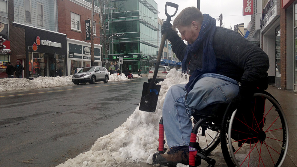 Paul Vienneau, 'Mayor of Spring Garden Road,' spent the afternoon clearing sidewalk corners and bus stops. 
