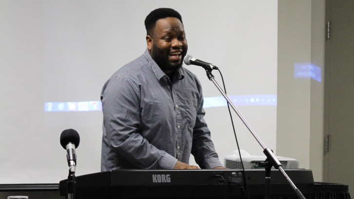 Owen 'O'Sound' Lee sings at the event "Racism is Killing Us Softly: Narratives of Young Black Men." 