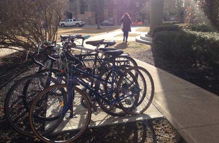 A rack of bikes parked outside the University of King's College.