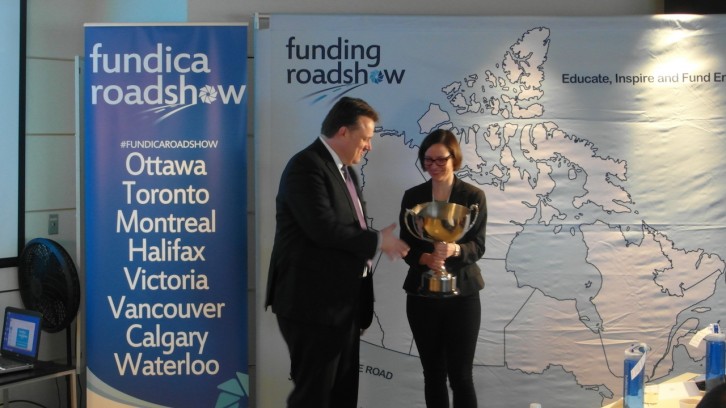 Charlotte Rydland receives the Fundica trophy from Mayor Michael Savage