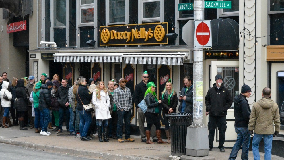People waiting outside Durty Nelly's for holiday celebrations.