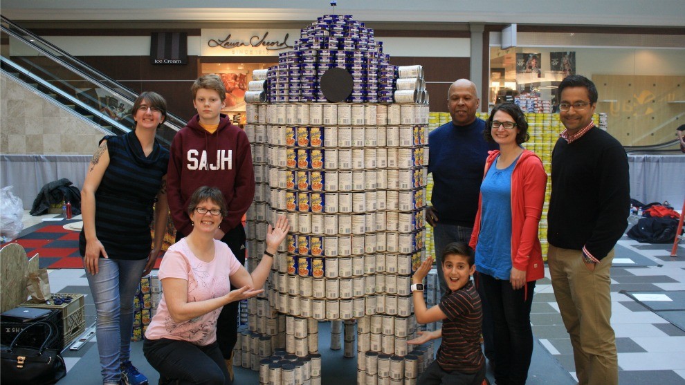 Caitlin Smithers (left) and the rest of First Baptist Church's Canstruction team.