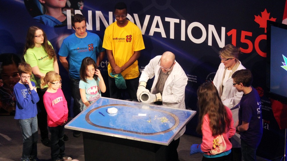 Martin Laforest, senior manager and scientific outreach at the Institute for Quantum Computing, does a quantum levitation demonstration for children.
