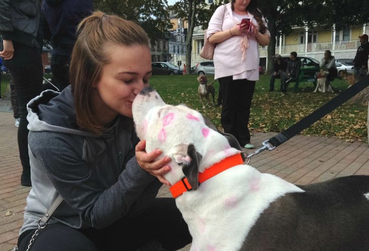 Gucci giving her owner Brittany Frizzell lots of love and kisses before the big march