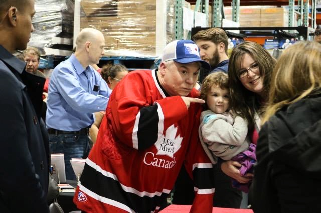 Canadian comic Mike Myers poses for photos with fans at Costco in Bayers Lake.