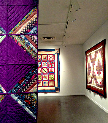 Three of the seven quilts at the exhibit in the Dalhousie Art Gallery.