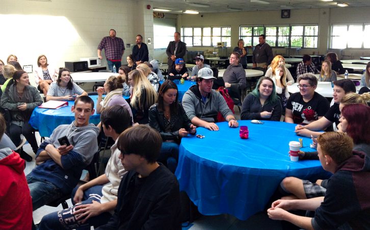 Students and visitors at Millwood High School gather to view the launch of the campaign.