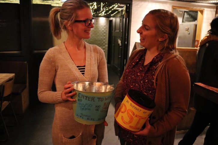 Meagan McPherson and Krystyna Brown hold a raffle to raise money for P.S.I.