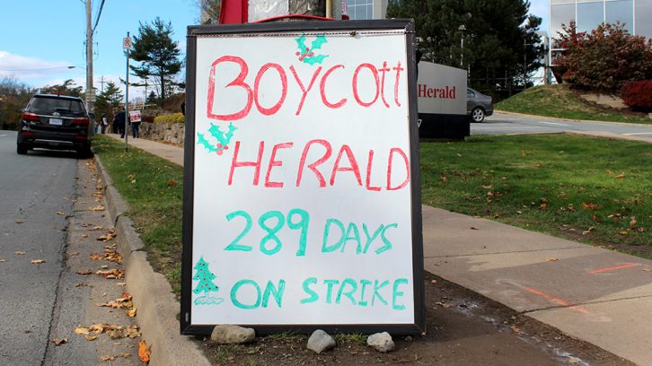 Unionized Herald workers have been on strike for nearly ten months.