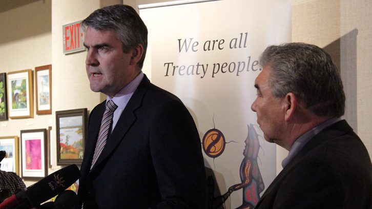 Premier Stephen McNeil and Glooscap Chief Sidney Peters speak with reporters at the Nova Scotia Archives. 