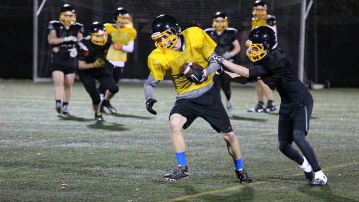 Members of the Atlantic Football League's Dalhousie Tigers practice at Wickwire Field. The 2016 edition of the team features players from Nova Scotia, New Brunswick, Ontario, Manitoba and The Bahamas