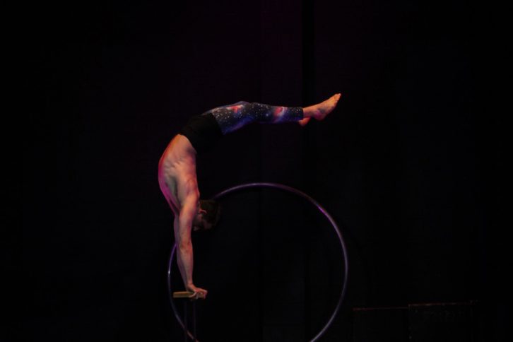 Smith performs his act on the cane bars.