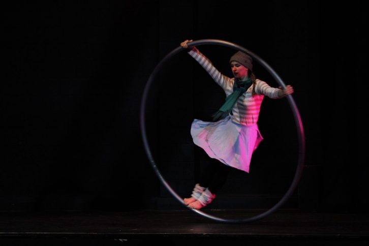 Christine Conrad takes a spin in the cyr wheel at the Friday show.