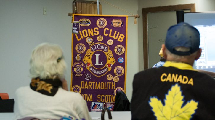 Lions Club members at weekly meeting 