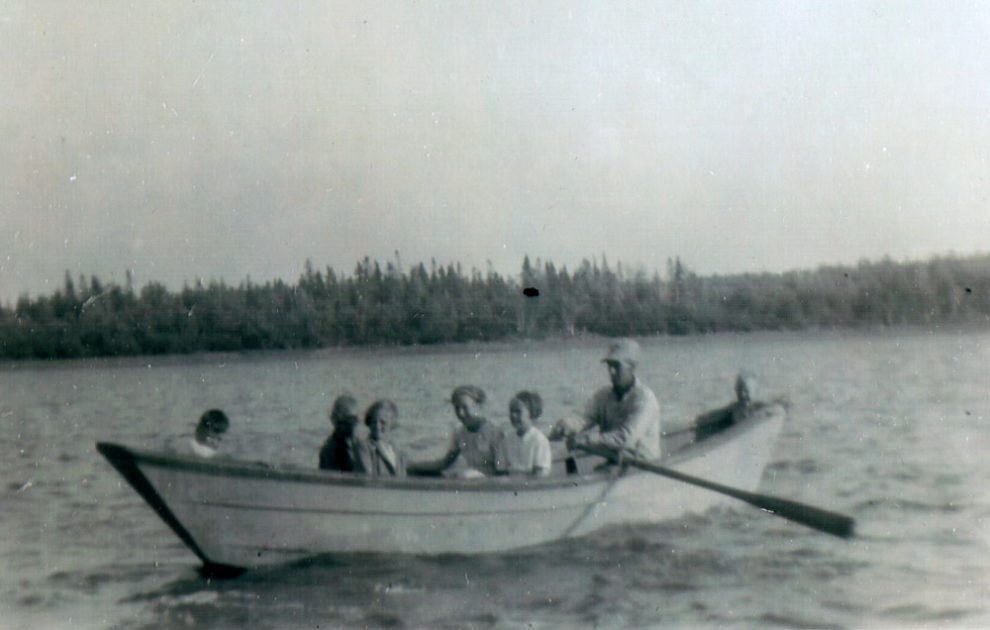 A photo taken in the late forties of Doug Mackay's neighbours, the Frasers, rowing in Boat Harbour. 