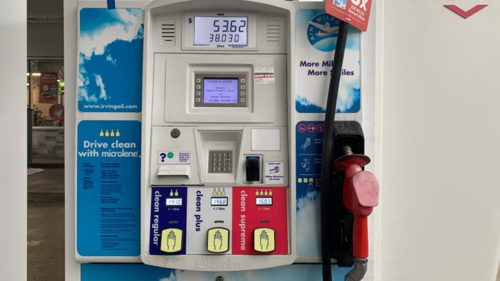 A Gas pump is shown with the prices for each type of gas listed.
