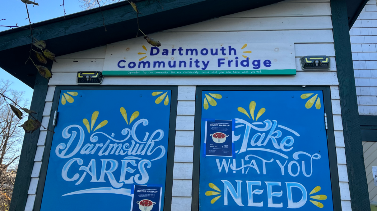 Exterior of the Dartmouth Community Fridge which is a one-storey shed with two doors. 