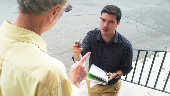 A young journalist doing an interview at the University of King’s College.