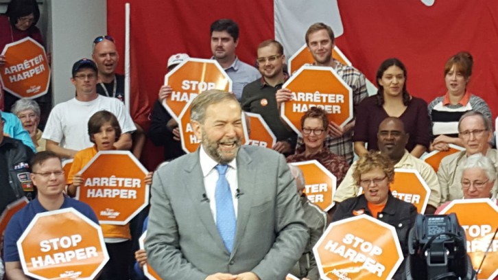 NDP leader Tom Mulcair surrounded by supporters at a rally in Dartmouth