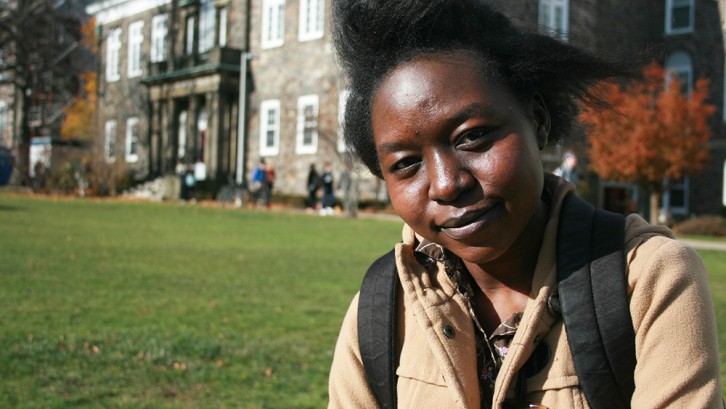 Wenasa Alaraba on the quad at Dalhousie. She grew up in Kakuma Refugee Camp, Kenya before coming to Halifax in 2014.