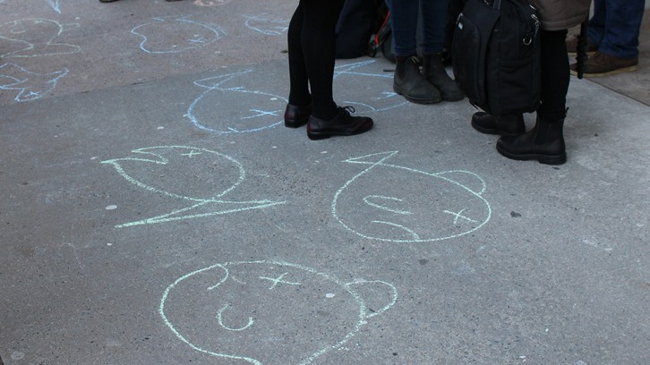 Chalk drawings of dead fish on the sidewalk outside CNSOPB's office in Halifax represented the damage an oil spill could cause to the environment.