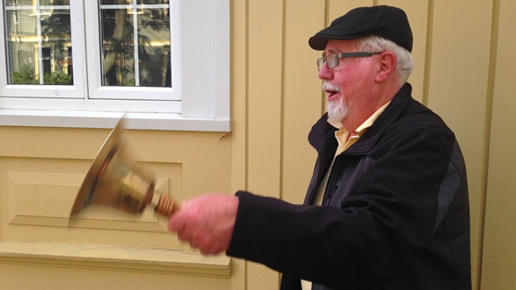 Former Halifax town crier David Nimmo rings his bell and yells “Oyez! Oyez! Oyez!” on Coburg Road.