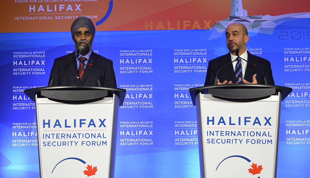 (Left to Right) Minister of National Defence Harjit Sajjan and Peter Van Praagh opened the security forum with a press conference.