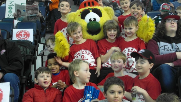 Hal with some young fans at a Mooseheads game