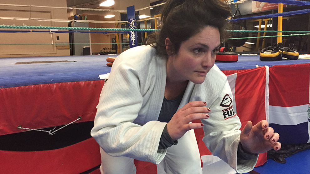 Sarah Murphy shows her jiu-jitsu moves at Titan's Fitness Academy.