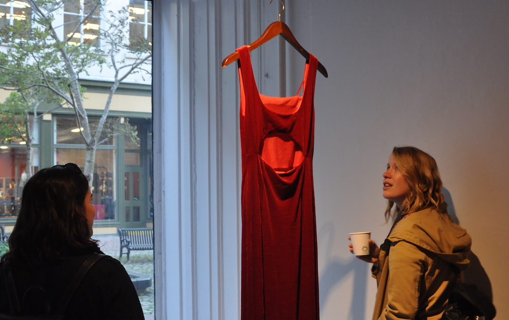 Rachel Berman (left) and Maddie Johnson viewing the REDRESS Project opening at Anna Leonowens Gallery in Halifax.