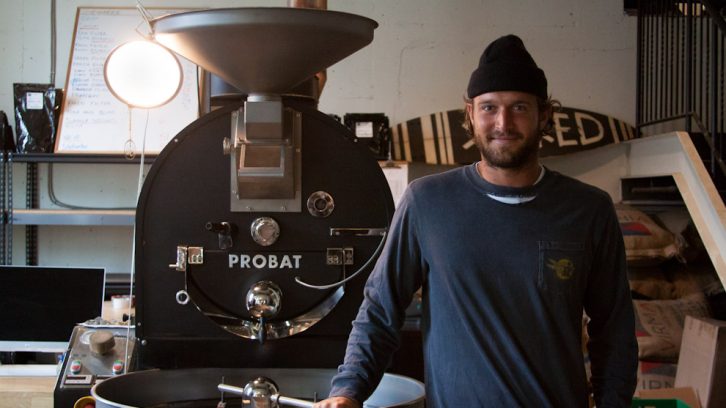 Dean Petty with Probat roaster used to roast coffee beans