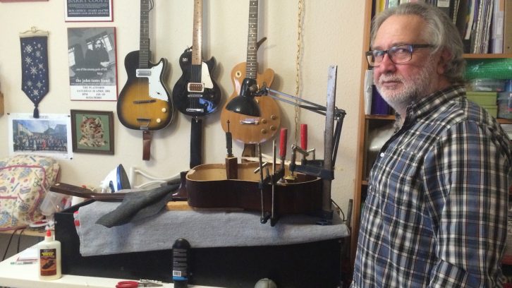 Calvert Lewis spends his free time collecting and fixing guitars to donate to Guitars for Vets