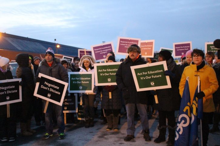 Teachers and their supporters gather at last month's rally outside the Dartmouth Sportsplex. 