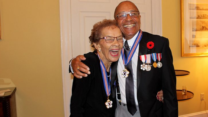Geraldine Browning (left) and Brad Barton (right) share a laugh after becoming members of the Order of Nova Scotia