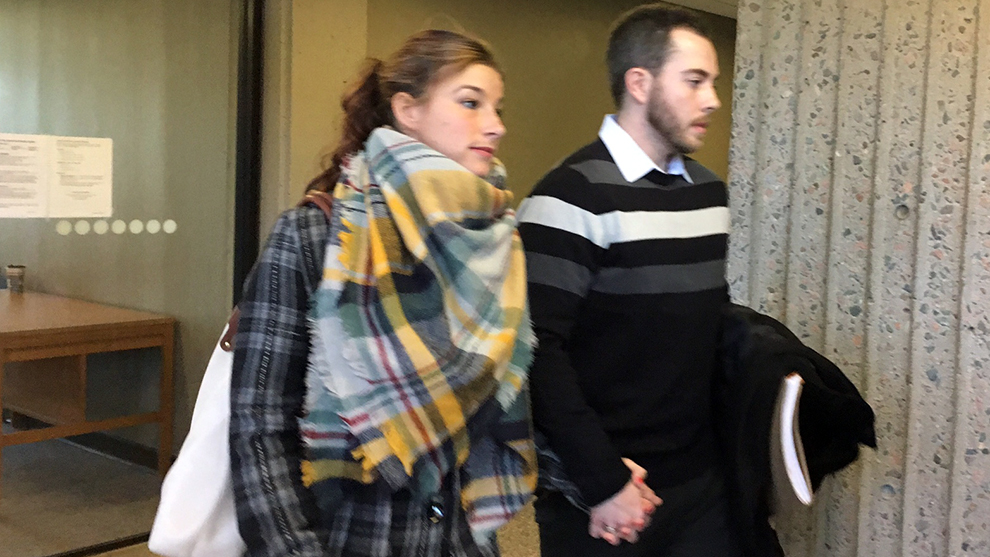 Christopher Garnier and girlfriend Brittany Francis exit the courtroom Thursday morning. 