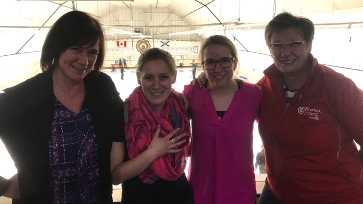 Skip Mary-Anne Arsenault, Second Jenn Baxter, Third Christina Black and Coach Carole MacLean at the Dartmouth Curling Club on Wednesday. Baxter is showing off the ring awarded for winning bronze at this year's Scotties.