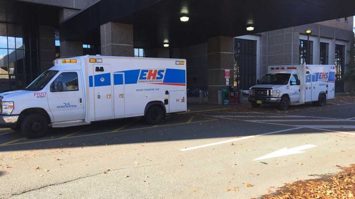 Two ambulances sit outside of the Halifax Infirmary on Wednesday afternoon.