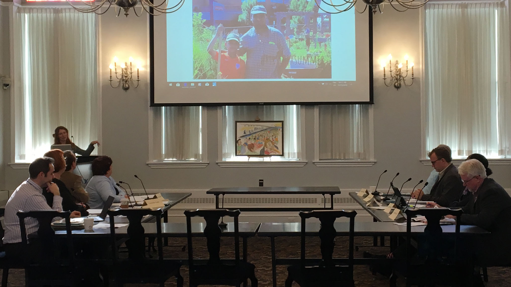 Jayme Melrose presents the Common Roots Urban Farm proposal to the Community Planning and Economic Development Standing Committee on Thursday. 