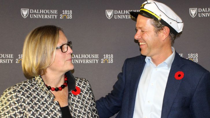 Kathryn Sullivan reconciles with opponent Boris Worm after the Great Debate at Dalhousie University.