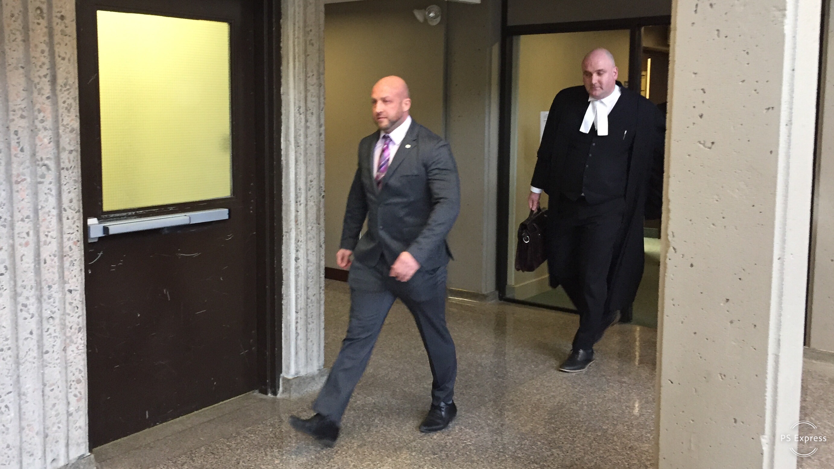 Darren Smalley (left) and his lawyer Ian Hutchison (right) leaving court after Smalley was found not guilty.